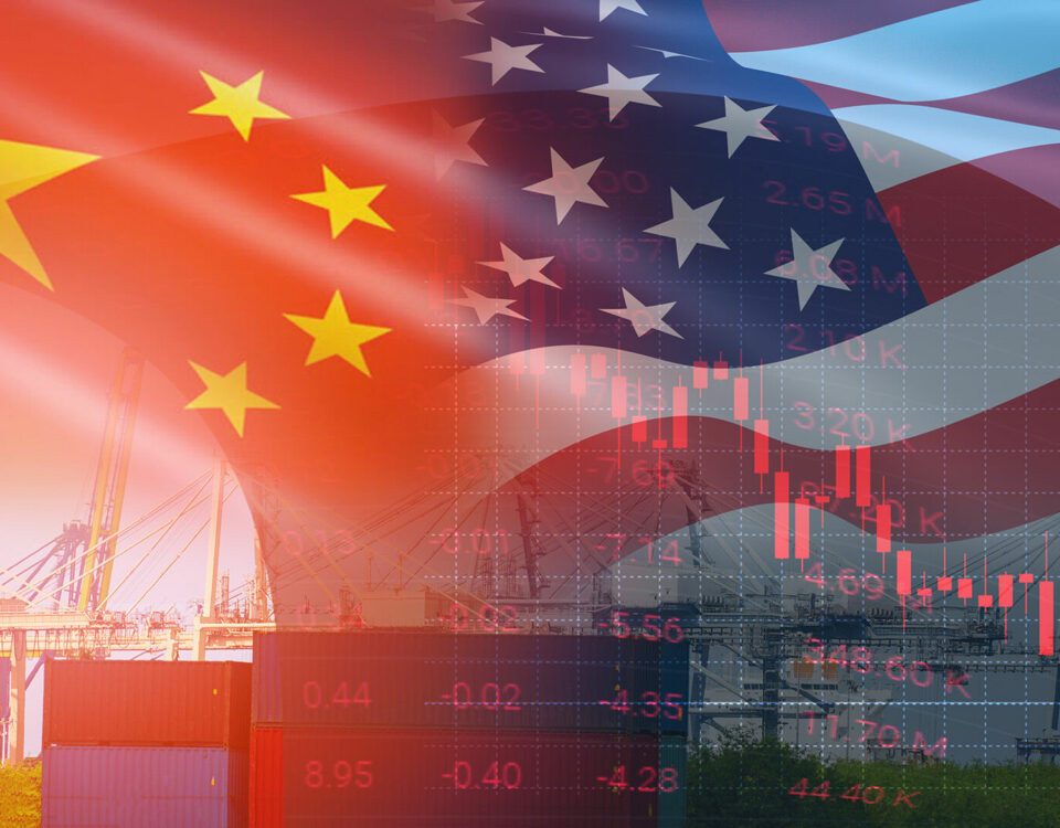 An American flag and Chinese flag stand side by side in the background, symbolizing the interconnectedness of global economies and the ongoing dynamics of international trade.