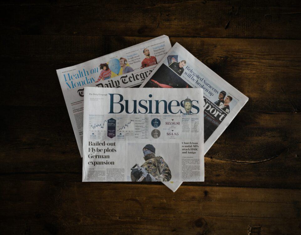 A newspaper featuring global market entry strategies and e-commerce platforms.