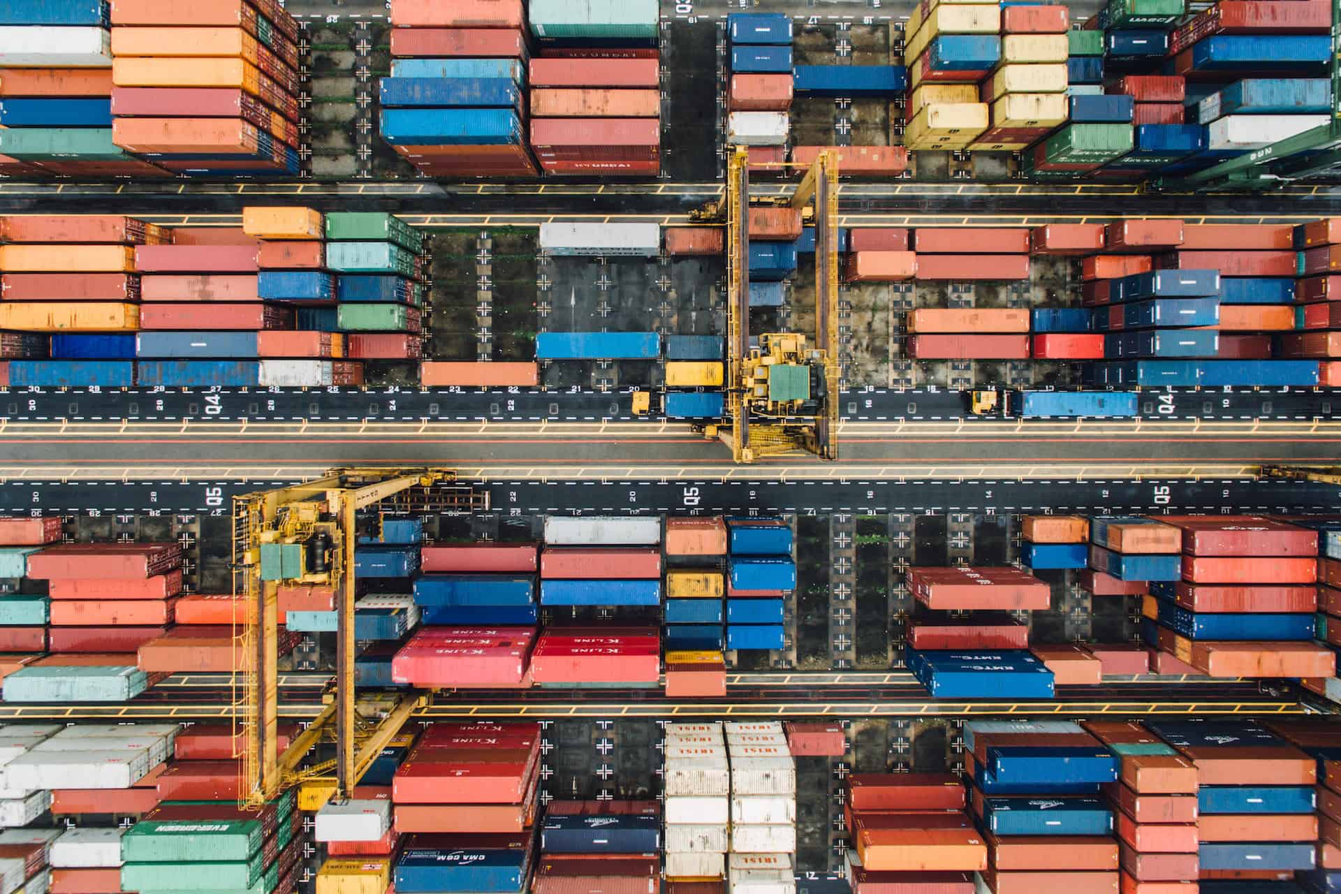 An aerial view of containers in a container yard showcasing global supply chains.