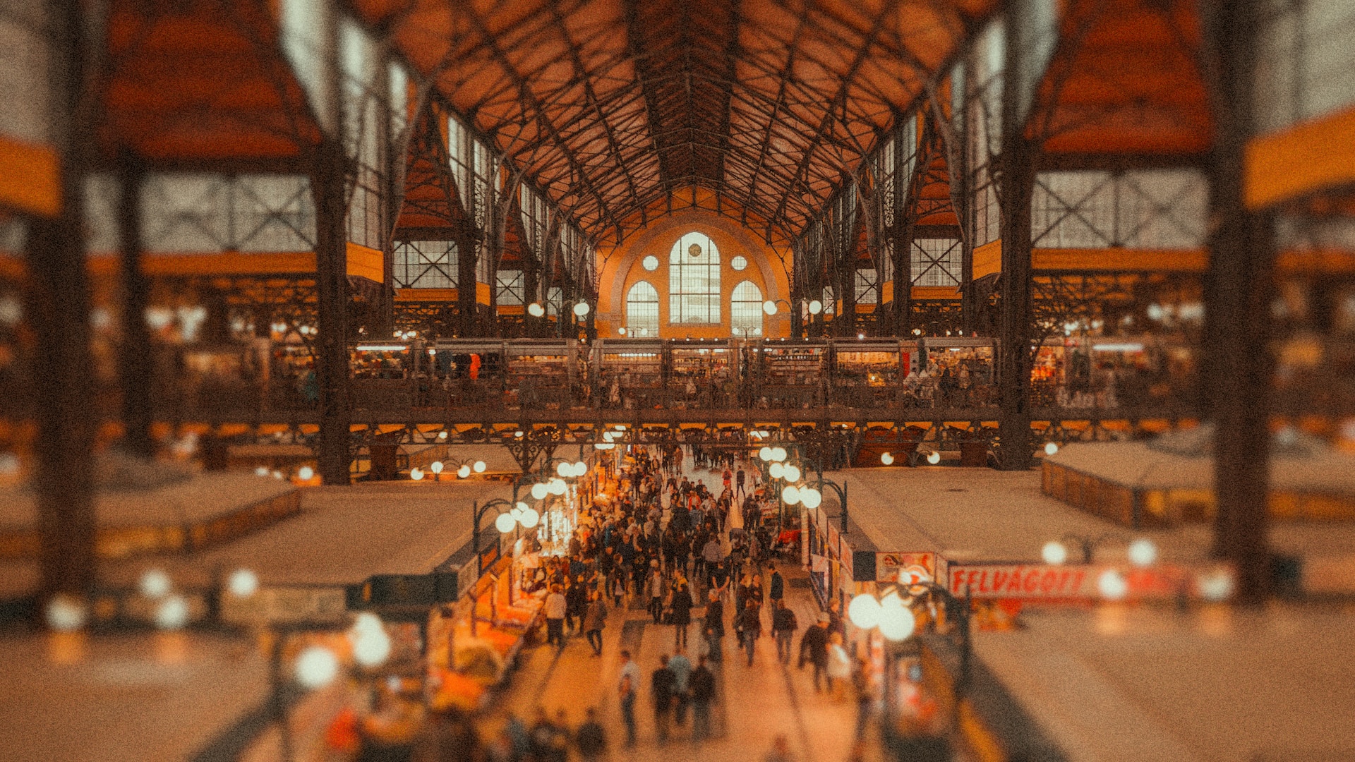 A bustling market teeming with people from diverse backgrounds.