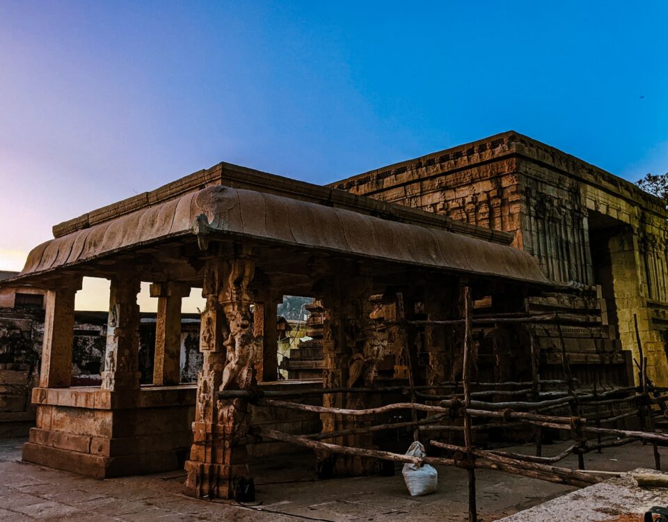 An international city at dusk featuring an Indian temple.