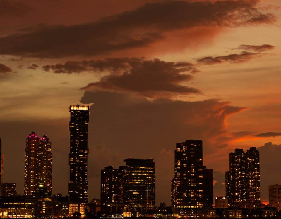 A North American Trade region with a city skyline at dusk.