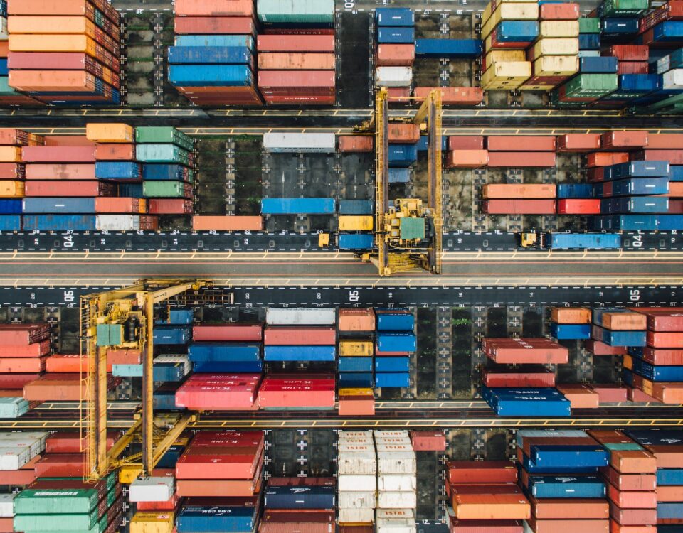 An aerial view of containers in a container yard showcasing global supply chains.