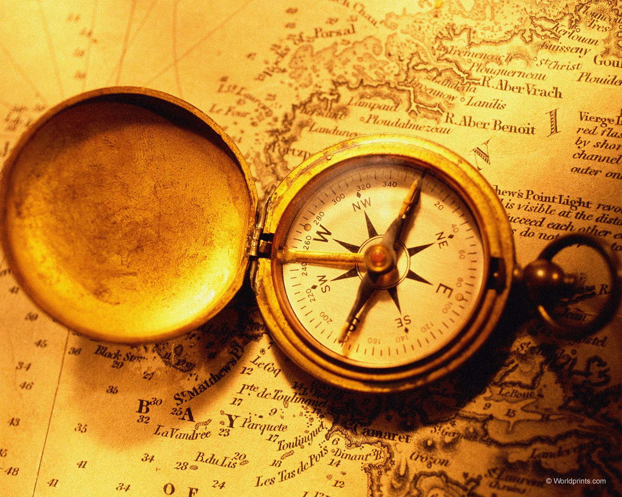 A gold compass atop a map guiding through international trade laws.