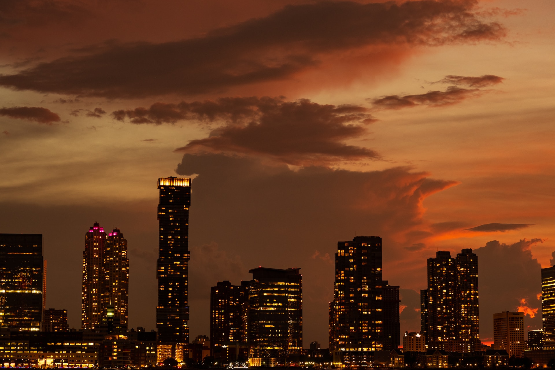 A North American Trade region with a city skyline at dusk.